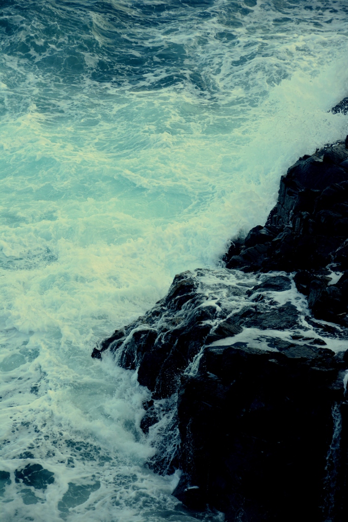 Waves crashing over rocks - a sight that never gets old or boring!